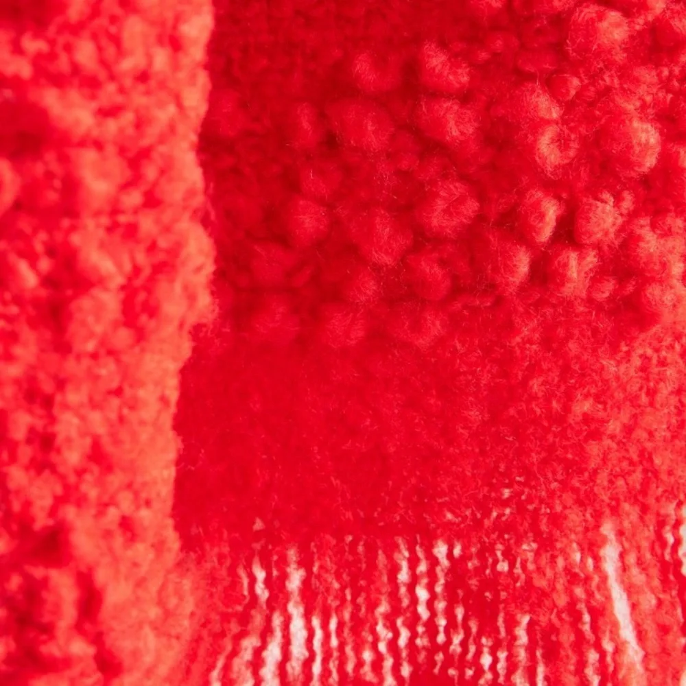 Red cloudy Bouclé throw blanket